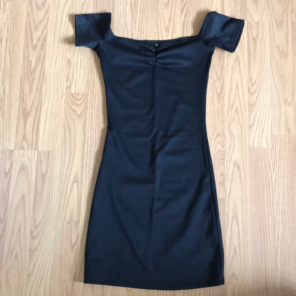 Black off the shoulder body con dress